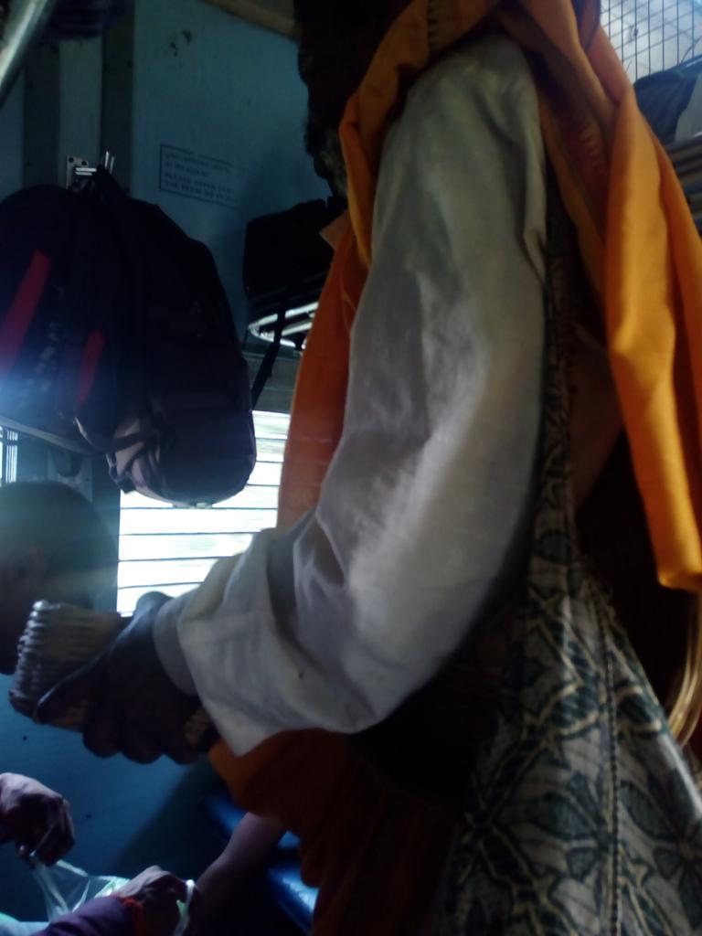 train no 12296....illegal activity..2nd last general bogi..one man moving with snack