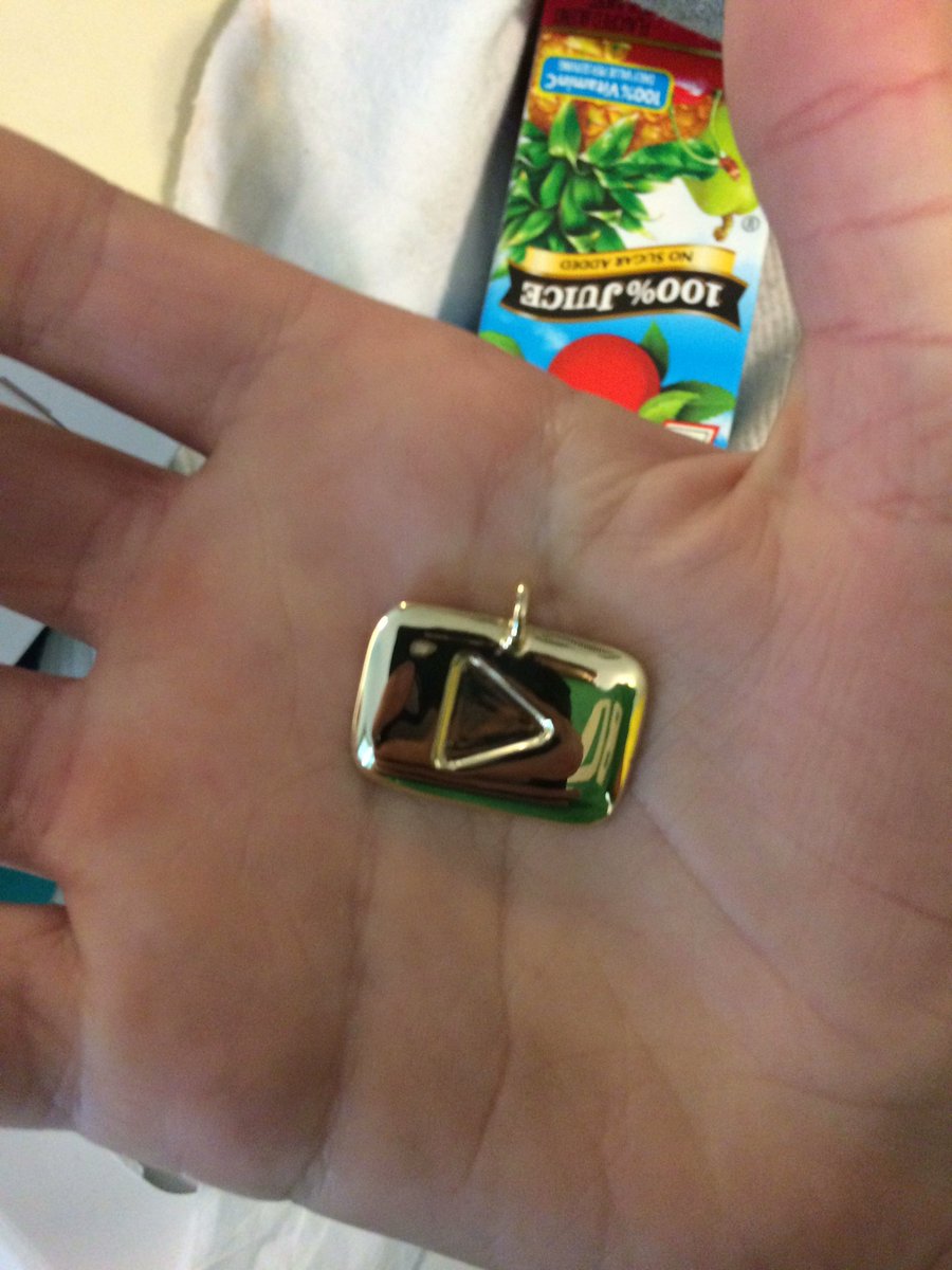 col433's tweet image. My YouTube play button necklace came in the mail today