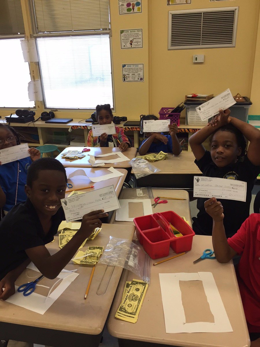 Livingston_sp's tweet photo. Students use Cougar Bucks to write checks and shop in Cougar Store! Standard form and written form! Math Rocks! #DTORocks @principallearns https://t.co/4PfRV2UNEO