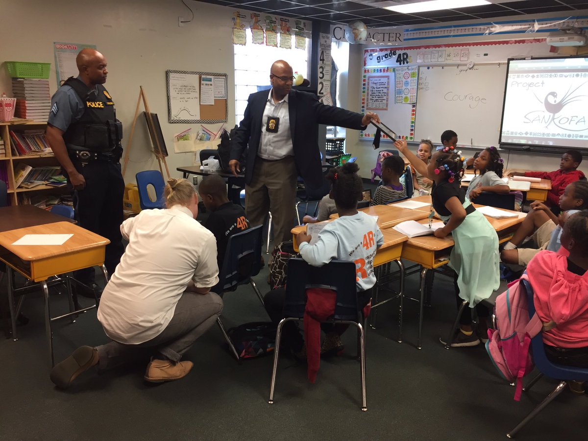 THellhake's tweet photo. .@kcpolice "share character"  @GPA_KC for #ProjectSankofa #GoBackToGiveBack https://t.co/5rm4ix9IS3