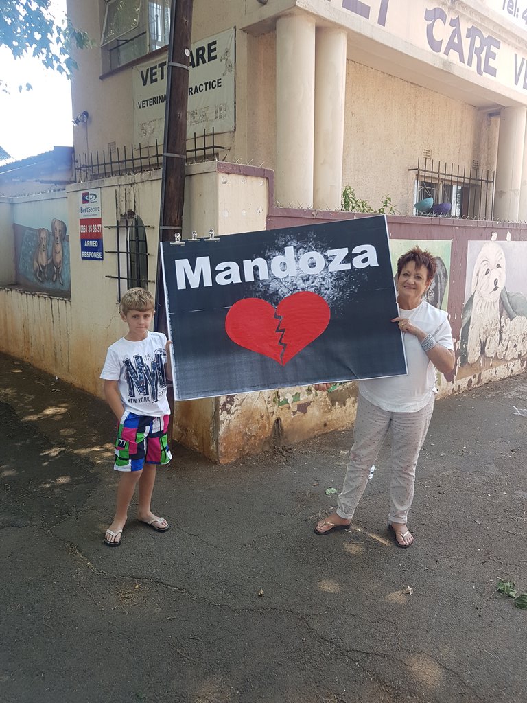 dannykmusic's tweet photo. Driving to West Park cemetery down a random suburban road we came across this! #Mandoza #MandozaFuneral https://t.co/zovhjgLlXj