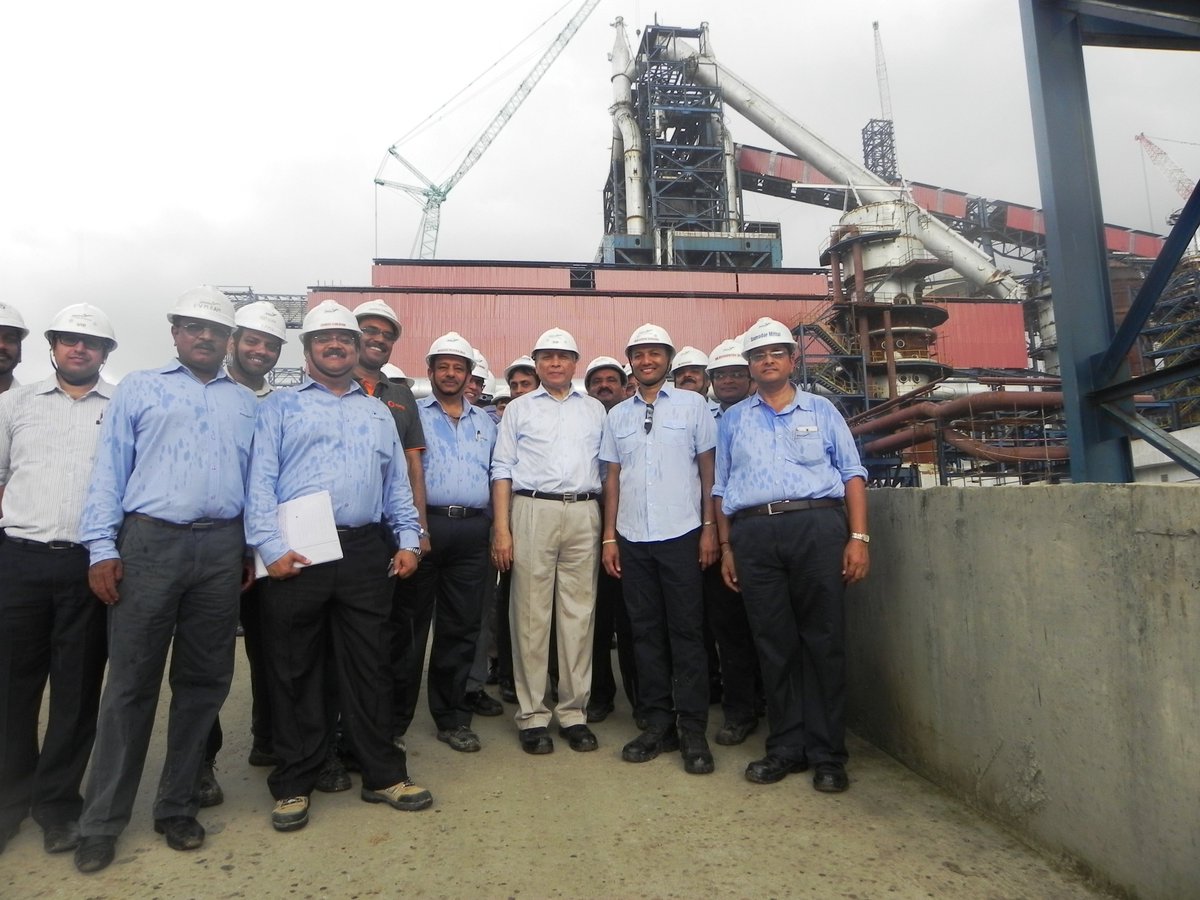 Proud team posing in front of India's largest &amp; most modern #BlastFurnace in the making (Angul, Odisha).