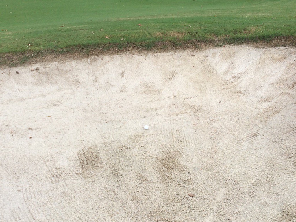 After an amazing tee shot that put us 129 yards from pin, my second shot traveled about 40 yds and found bunker.