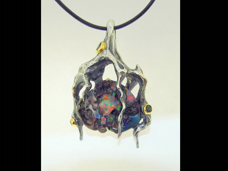 YankeDesigns's tweet image. Sterling Silver and 18kt Yellow Gold Pendant with handcarved Boulder Opal and Chrome Tourmaline. Awesome!