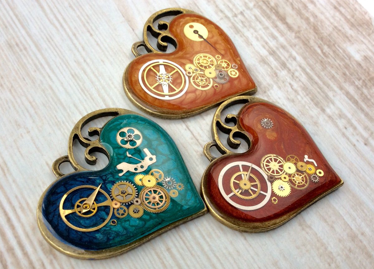 OneDottyDuck's tweet image. More colours in these stunning heart pendants. Which is your favourite? #hearts #heart #clockworkheart #necklace #orange #blue #red #etsy
