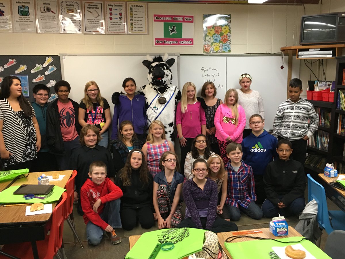 mandanschools's tweet photo. Alyssa from Mary Stark was the MPO Octoberfest coloring contest winner. Bella the Tru Moo Cow brought the whole class choc milk and donuts. https://t.co/IEF6nS1L86