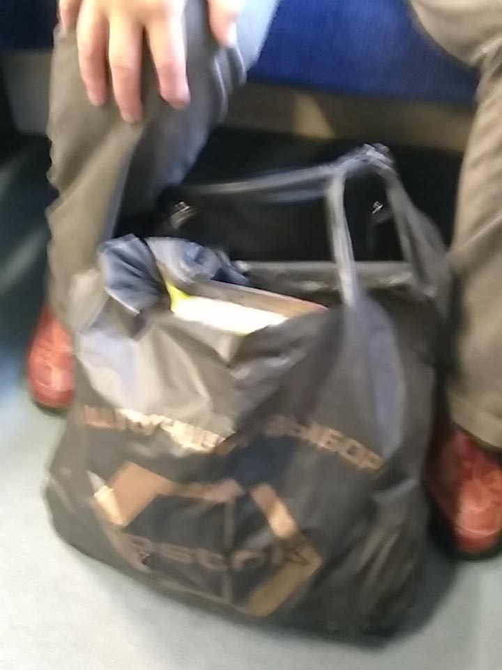 All Aboard the Smiley Express. It's Border Guards time from Minsk to Vilnius. A contraband banana I see :-)
