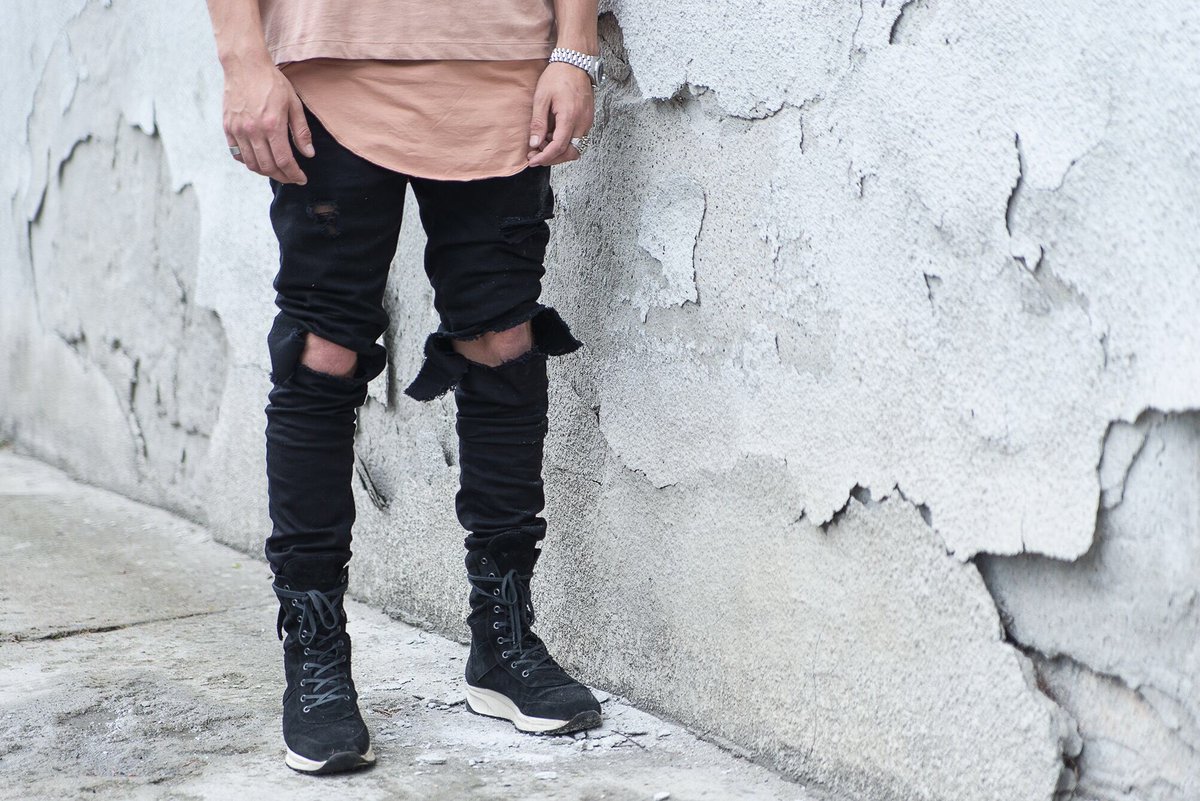 black jeans blown out knees