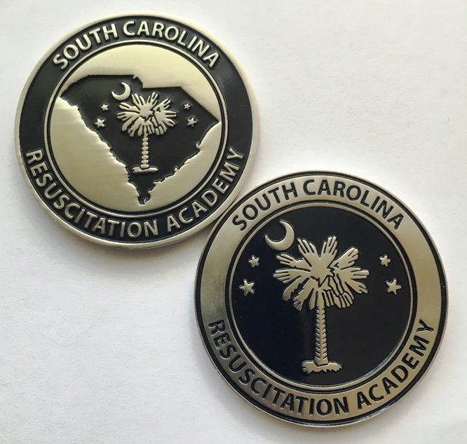 SCResusAcademy's tweet photo. Freshly minted challenge coins for the South Carolina Resuscitation Academy! #SCRA2016 https://t.co/Ke4ofveXpQ