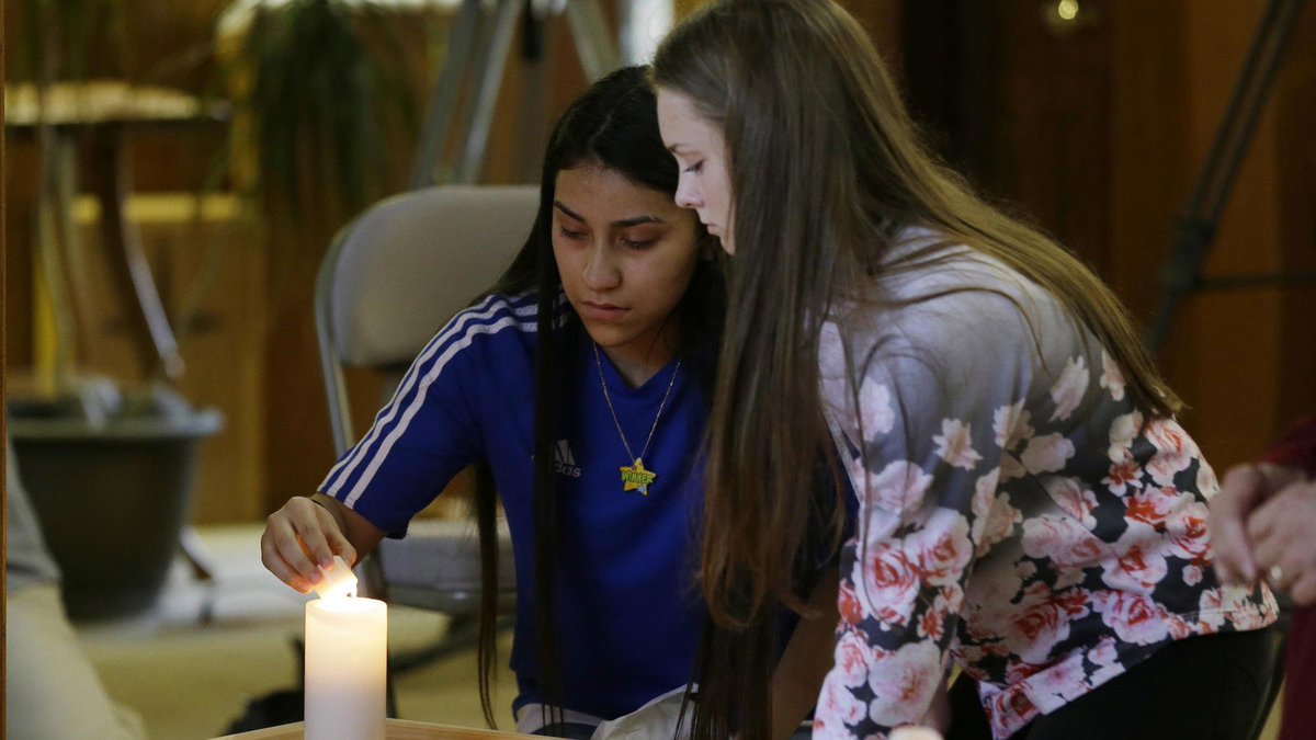 Authorities say the suspect in a deadly shooting at a Washington state mall is in custody