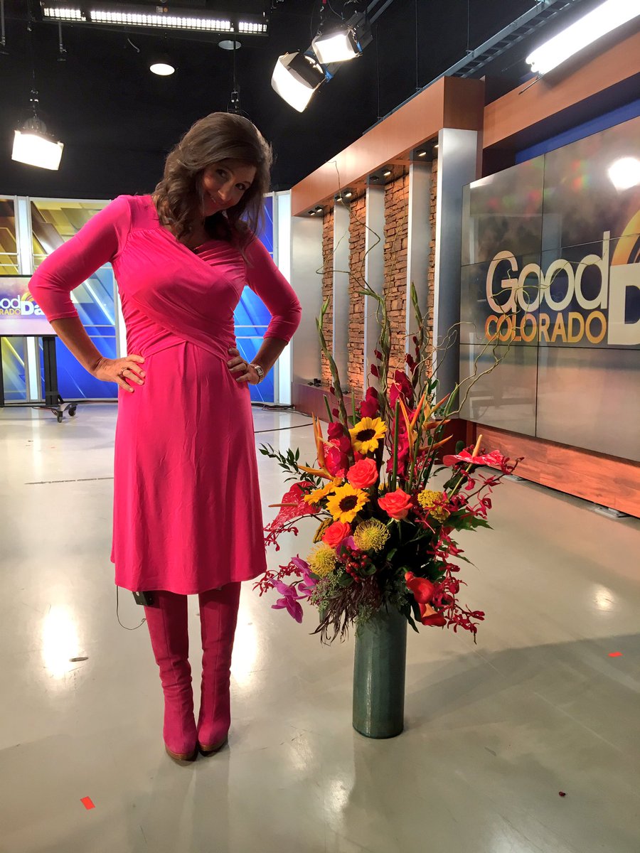 Enjoying my beautiful goodbye bouquet from @KDVR - almost as tall as me!