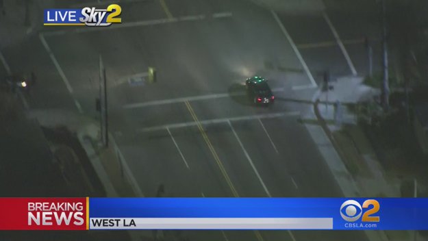 Stolen car suspect remains on surface streets but has run several red lights at high speed in West LA