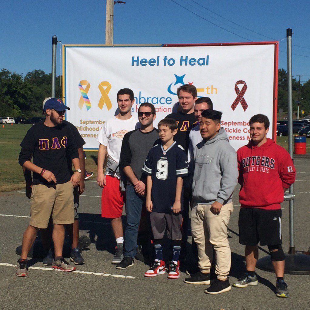 luvhandle's tweet image. Rutgers #pilambdaphi chapter initiates newest honorary member at #embracekids #heeltoheal