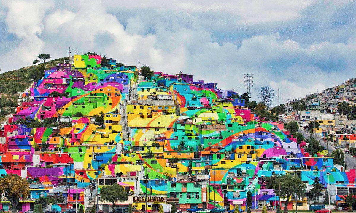 Artists <a href="/GermenMuralismo/">Germen</a> spent 14 months turning the hillside of #LasPalmitas into a giant #mural to bring the working-class together.
#art