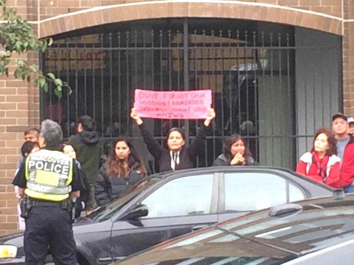 "Don't forget our missing and murdered." Estimating 300-400 people lining streets around <a href="/ShewayBC/">Sheway</a>. Royals inside now. #RoyalVisitCanada