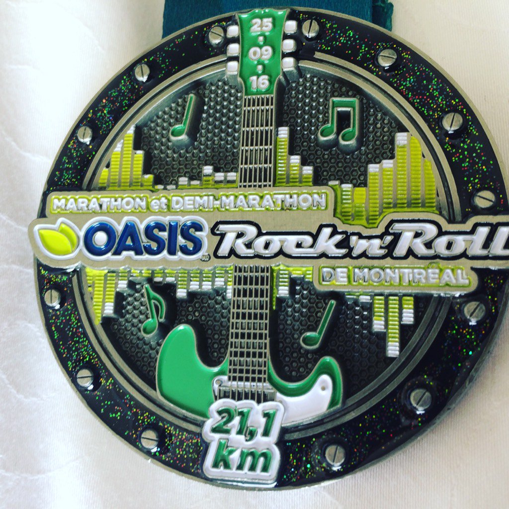 iRunNation's tweet photo. One of the coolest finisher medals EVER! Thanks @OasisCanada Montreal @runrocknroll marathon #runmontreal https://t.co/XDbKyEhkD4