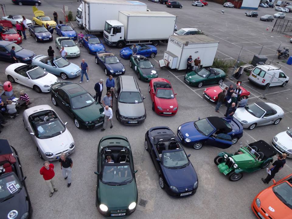MGFRegister's tweet photo. Great overhead shot by Andy Phillips of the cars gathering at #simonsdiner for the start of the TBAT event @MGCarClub https://t.co/ZOa9udnegy