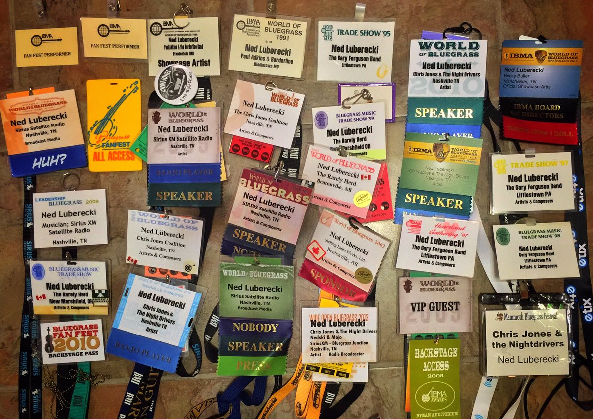 NedLuberecki's tweet photo. A couple of years worth of #IBMA name tags. I think the ones in the upper left are from '88 & 89. @IntlBluegrass #WOB #WOB2016 #Bluegras https://t.co/gg30FFB3Mj