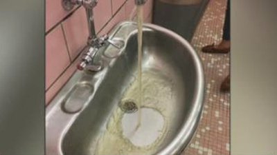 Student suspended after posting picture of discolored water in school bathroom