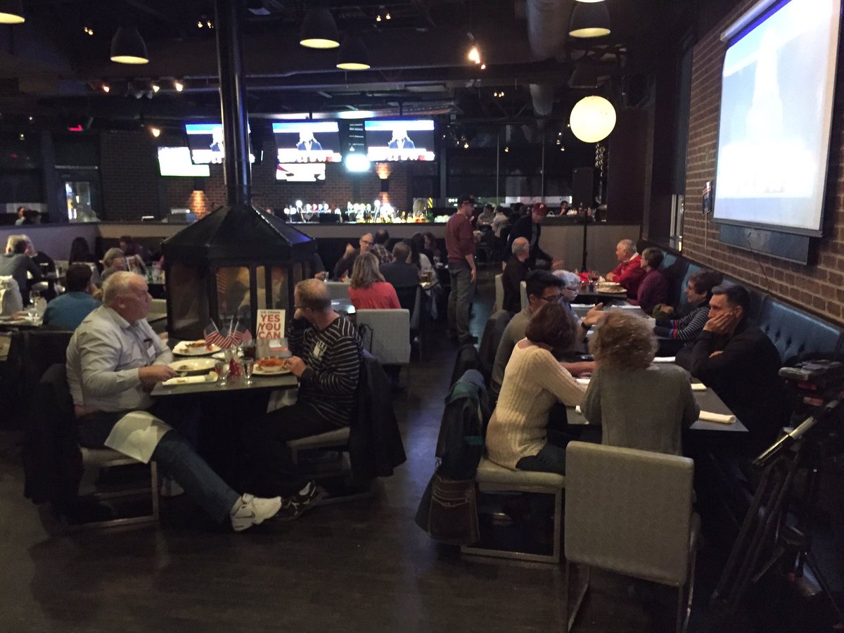 Dozens are gathered at Confusion Corner Grill in Winnipeg to watch the US presidential debate. debatenight cbcmb