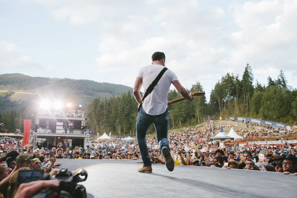SunfestCountry's tweet photo. This #NeverMonday photo is brought to you by @chasebryant and his epic performance at #SunfestCountry last year. Who's ready for 2017!? https://t.co/ghO6XBA8EB