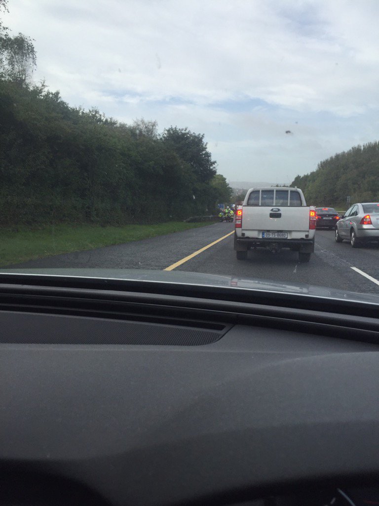MccarthyjJohn's tweet photo. Garda on hard shoulder Dublin side of RAB going into cork. Hard shoulder should be open for traffic to Middleton. https://t.co/TjAGvy6Thi