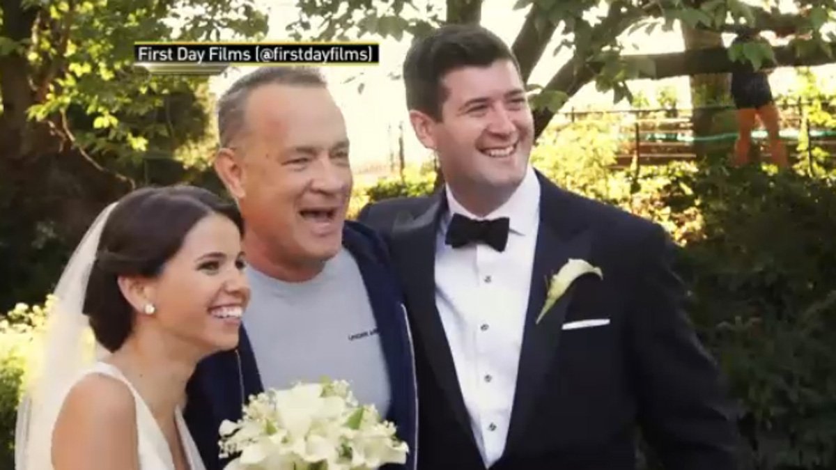 Watch as Tom Hanks appears out of nowhere, photobombs couple's Central Park wedding shoot (Credit: @firstdayfilms) 4.nbcny.com/Zasphqv