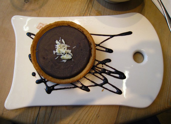 wguild's tweet photo. #GuildCafe team spoiling us again today with delicious chocolate tart for dessert @MorrLaw @WimbledonBrew https://t.co/bEgWQDnfOF