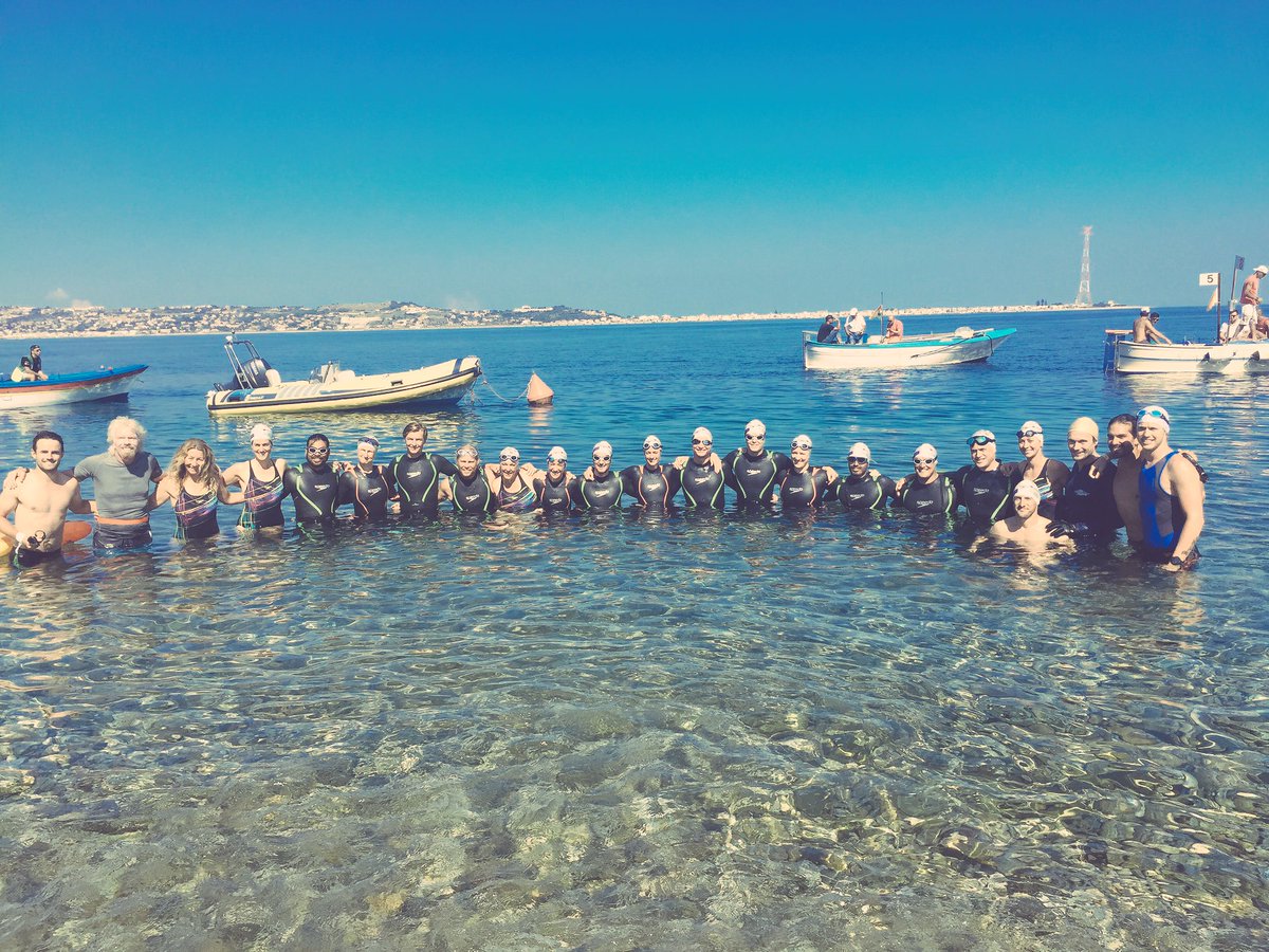 Core Team in the water.... 3.3km ahead until we get to Sicily #WeSTRIVE