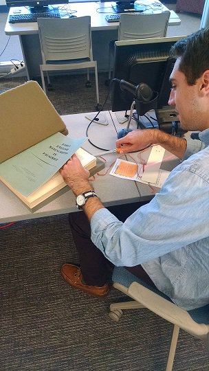 u_mspcoll's tweet photo. Our intrepid Reader Services Assistant, Eric, carefully opening uncut pages. #booksareforuse https://t.co/HNwVfrBtYj
