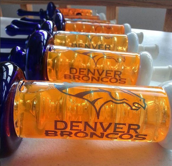 BradWilsonGlass's tweet photo. On display, my #DenverBroncos #NectarCollector @champstradeshow in #DowntownDenver this week, stop by check em out. #headyglass #glassart https://t.co/8M7rkfRbZO