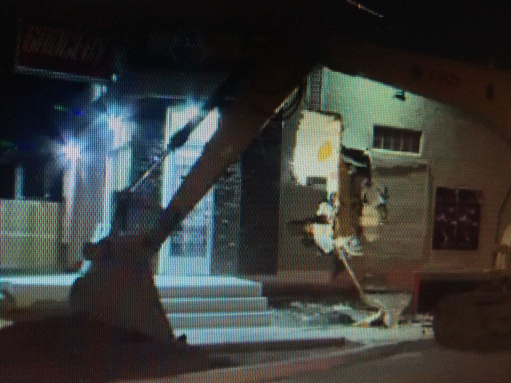 Someone grabbed an excavator to gothrough a wall and pull out an ATM. The security camera caught it all. On at 6.