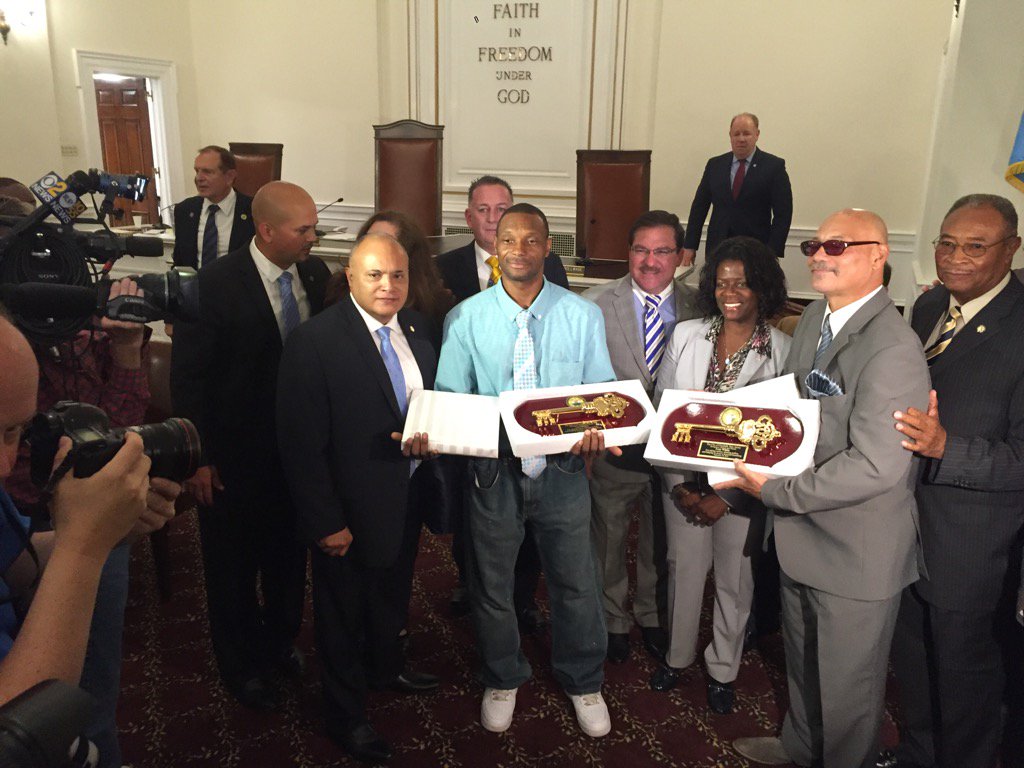 Two men who found pipe bombs by train station in Elizabeth and notified police, presented with keys to city.