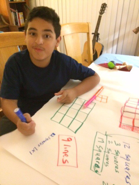 JackDieckmann's tweet photo. @JackDieckmann Here is my son, Joe (12), working on the math challenge at home! He's just had an "aha" math moment, predicting # of squares! https://t.co/OVyL4NJyPA