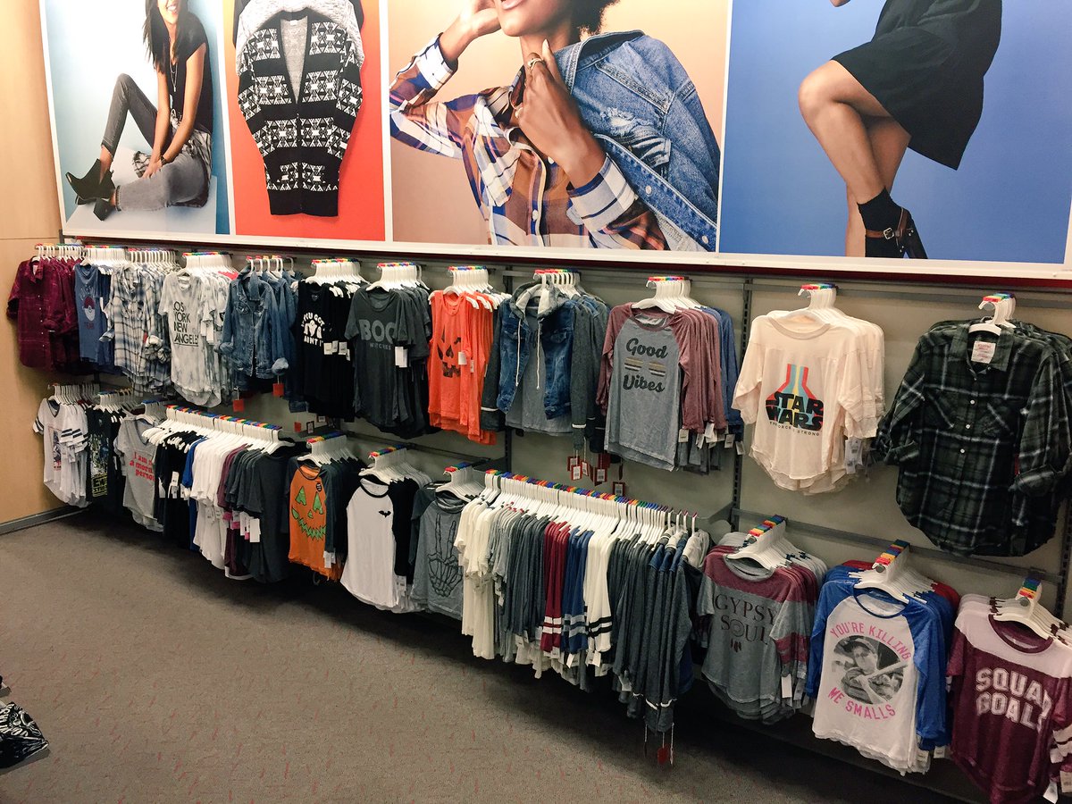 Graphic tee back wall revamp from last week. #pairyourfave #withaflannelordenimjacket #halloweenshopincenter