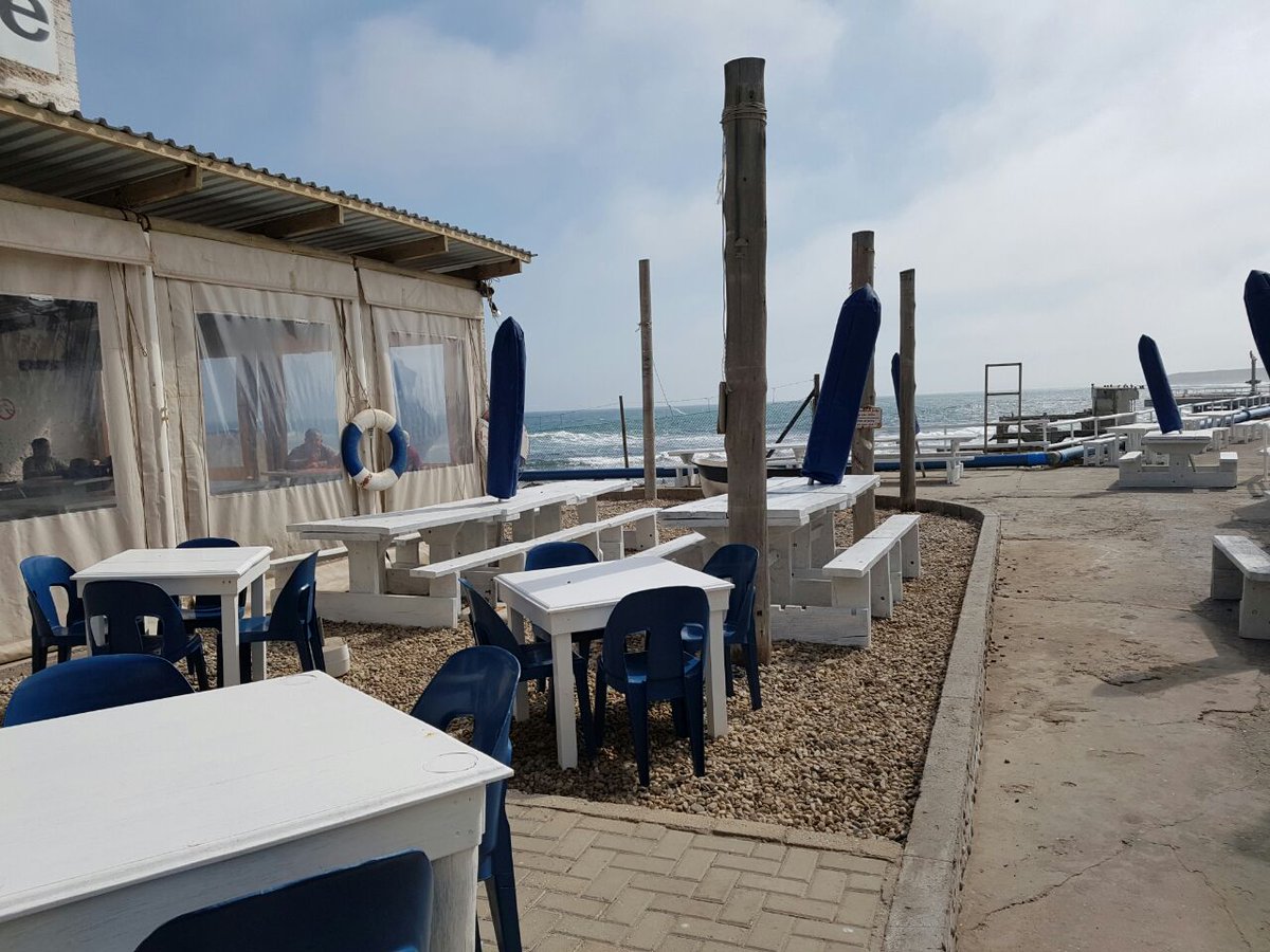 SACLMag's tweet photo. Yesterday was a perfect day on the #WestCoast with Jan and Renske van Zyl of @FryersCove. Fresh fish &amp; chips and a glass of wine. #CLTours https://t.co/KV7voWZeNL