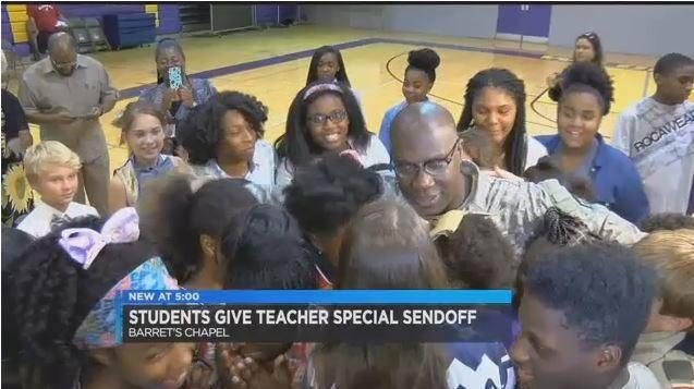 Students give their teacher a very special send off as he heads for Iraq. wmc5