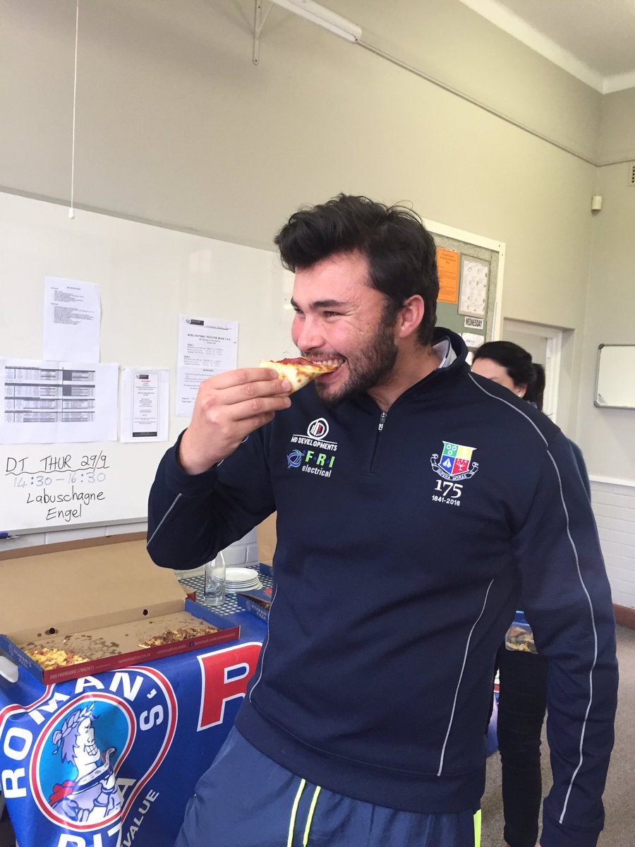 Staff indulging in the most tastiest pizzas from <a href="/romans_pizza/">Roman's Pizza</a> Plumstead Branch. Thanks for getting our energy levels up before end of term