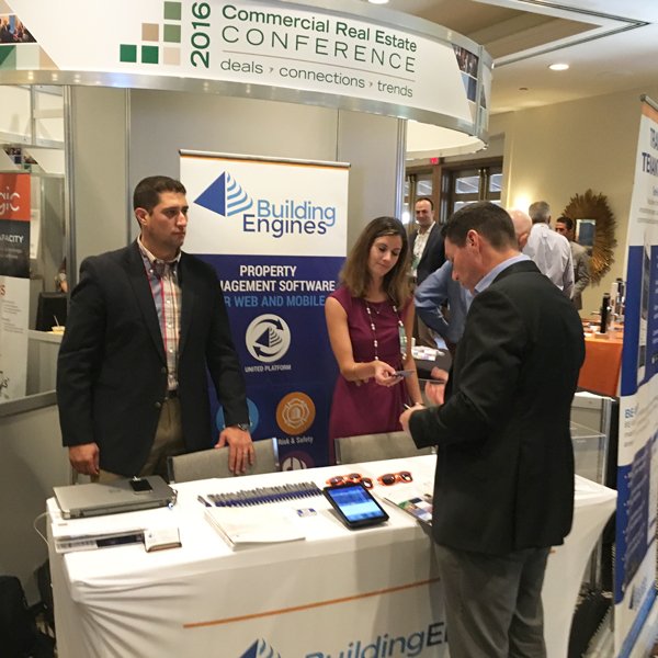 buildingengines's tweet photo. We had a great time at #CREC16 - how about you? Here's a candid of Jen and @TBrennan513 hard at work during the show. #CRE @NAIOP https://t.co/TxkhrVxJF9