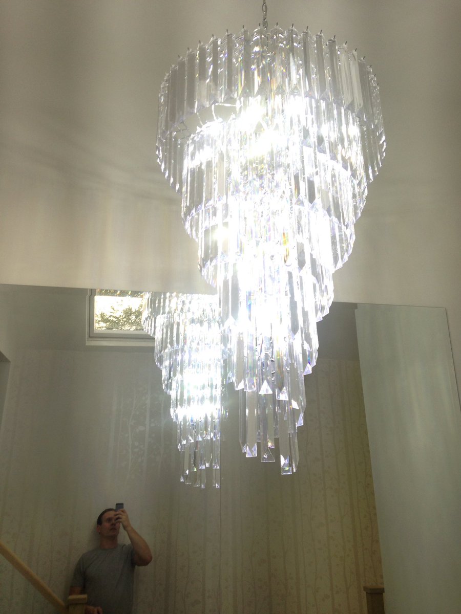 electrical_0's tweet image. New chandelier install above glass staircase