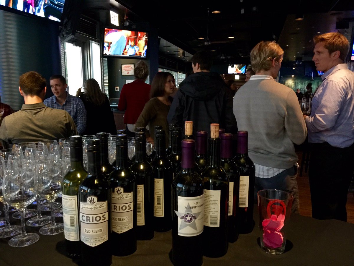 Serving up some wine samples for a good cause! #WinedUpWednesday