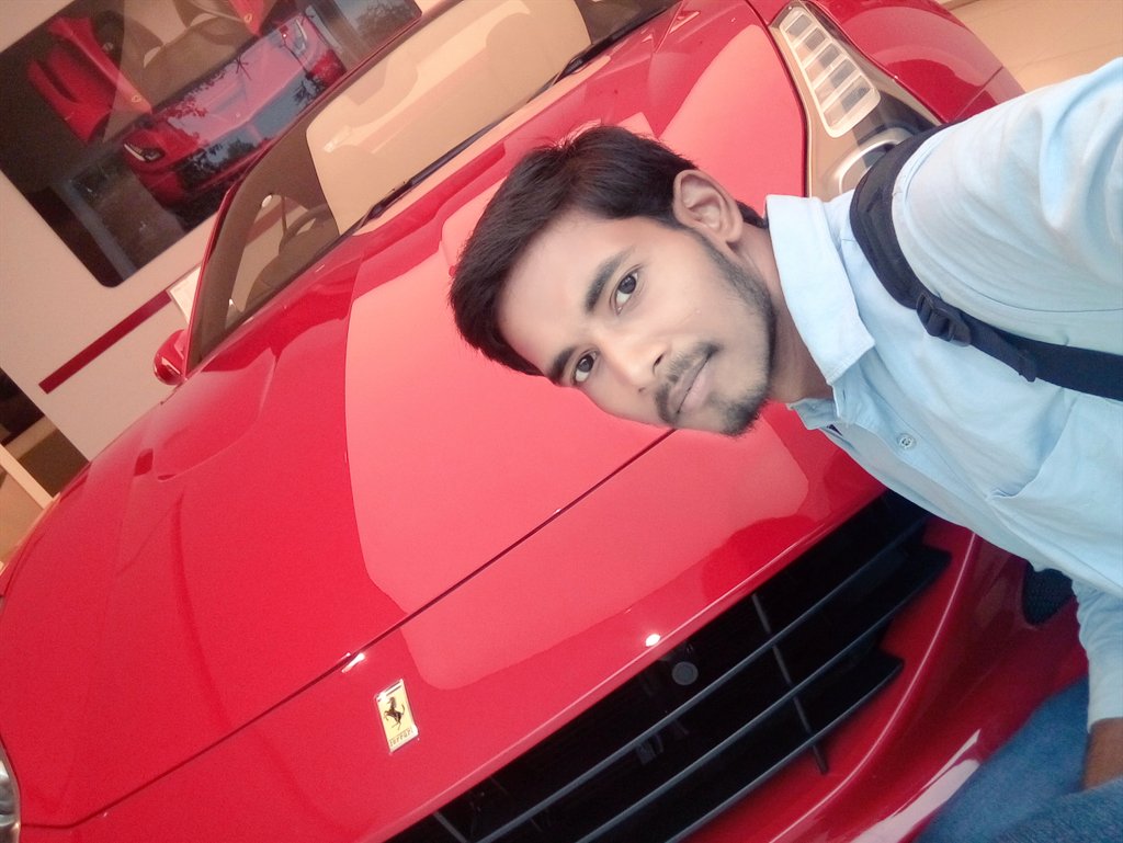 RahulSah23's tweet photo. Taking selfie in Ferrari show room https://t.co/HgtCqf4C89