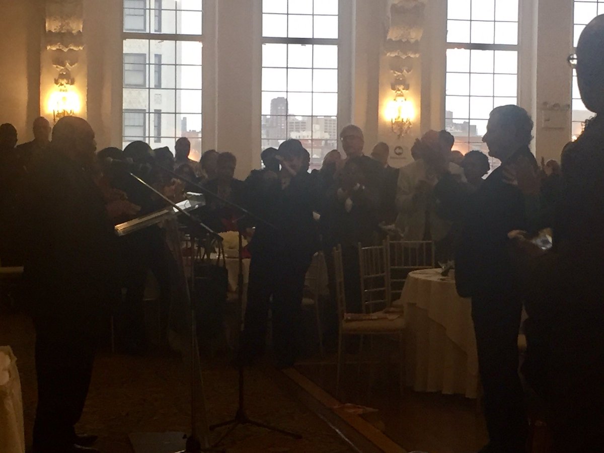 LaborAwards's tweet photo. @1199SEIU George Gresham gets a standing ovation when presenting a the 'Tying Communities Together' Award to a surprise honoree! https://t.co/eJkgpXrzGp