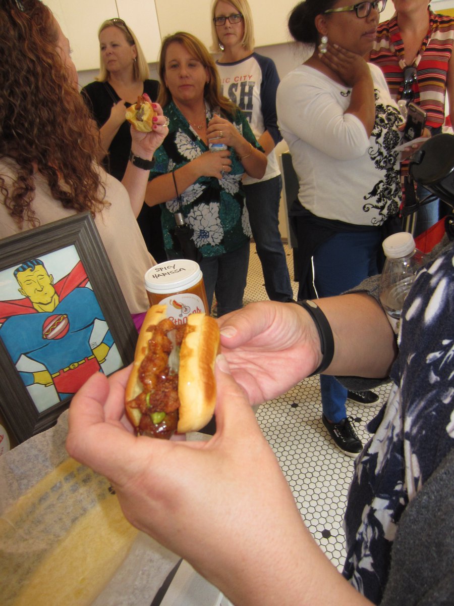 Floral Pork Dog (pepper romesco, lime pickled onion, cornbread) Straight from the owner's mouth (Michelle Shriver) to yours at <a href="/stroopsrva/">Stroops</a>.