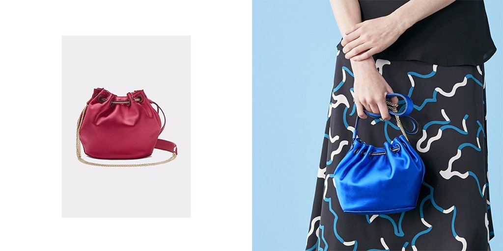 DVF's tweet photo. The #DVF Satin bucket bag adds a luxe touch with room for all your essentials. Shop now: https://t.co/ZqUmTRXr7U https://t.co/v9ksoapeuq