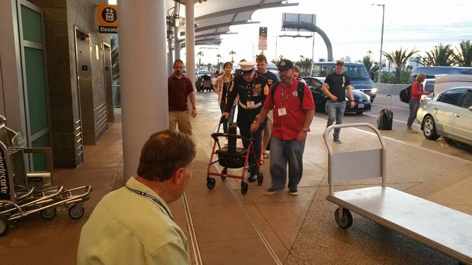SDMesaSVO's tweet photo. Some of our members taking time to help WWII Veterans board their flight to Washington DC #HonorFlightSanDiego #ServiceSelfie https://t.co/crUxHCZmEL