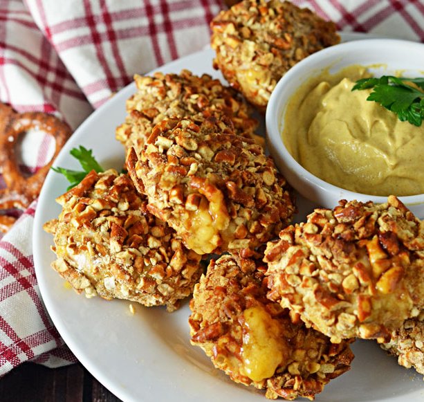 We're swooning over these Pretzel-Crusted Chicken Nuggets Stuffed With Beer Cheese from Host the Toast! bit.ly/2dx7afs