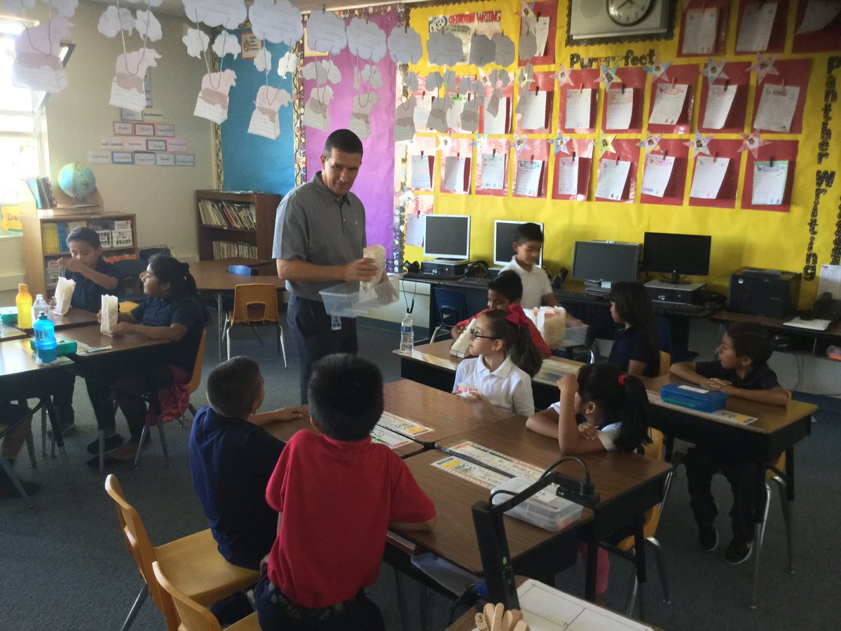 Pawsitivepride's tweet photo. Dr. Suhr at Mrs. Ryan's "Just Read" popcorn party. @nmusd #pawsitivepride https://t.co/mh8uOxO1de