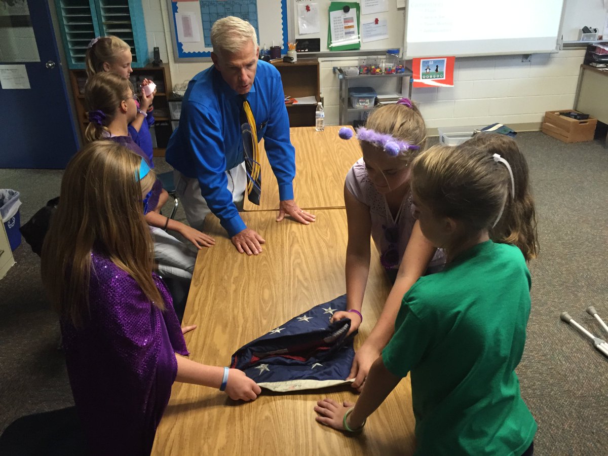 TSALEW's tweet photo. Student Leadership Club learning how to fold a flag today! @myflinthill #studentelectives https://t.co/E6O9ywihiv