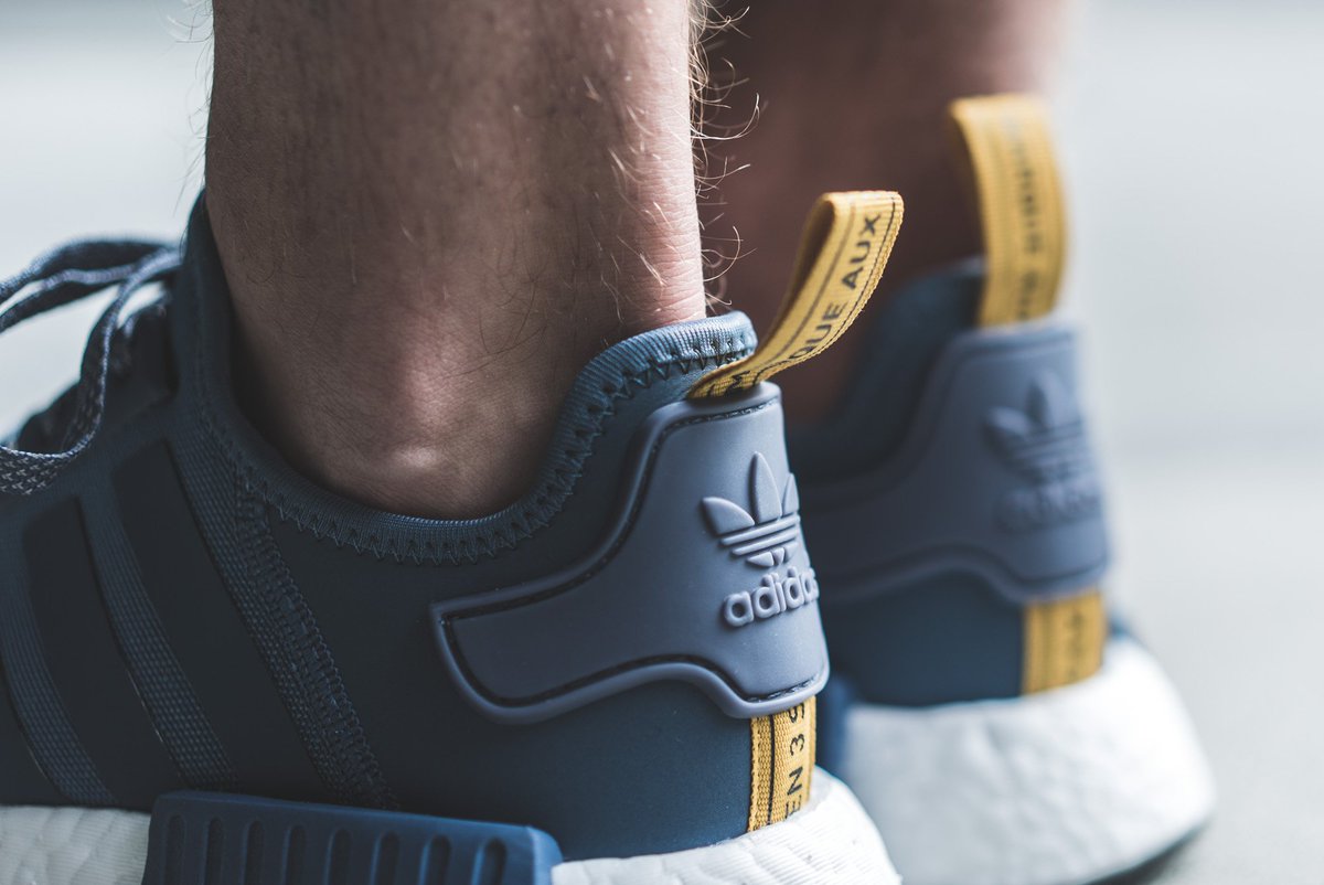The adidas NMD R1 Primeknit Salmon Looks Fire On Foot Closer